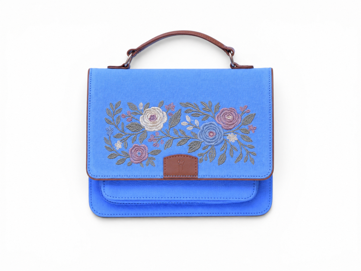 Needlesay Azure blue embroidered denim handbag front view