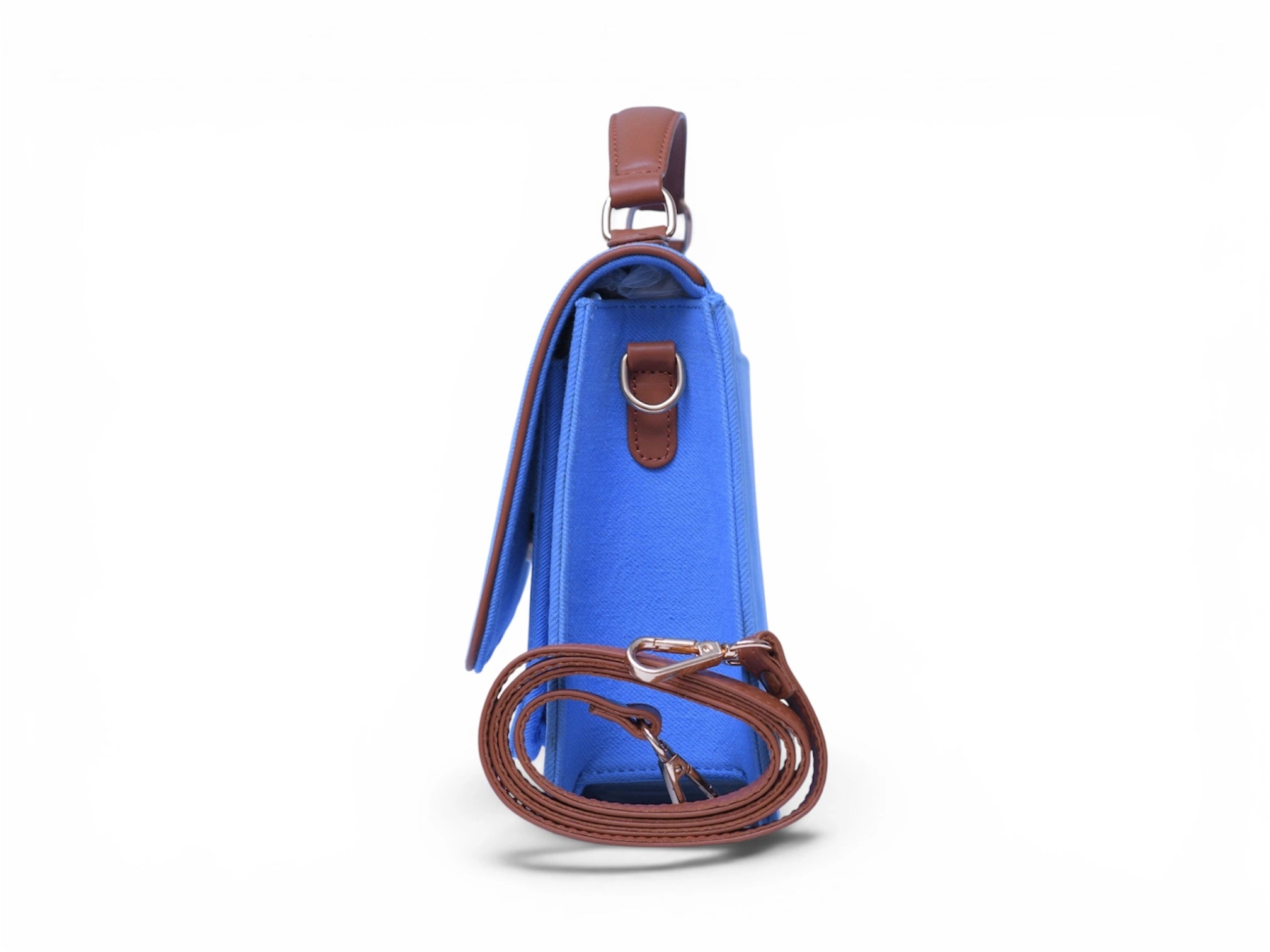 Needlesay Azure blue denim handbag side view
