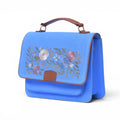 Needlesay Azure blue embroidered denim handbag potrait view