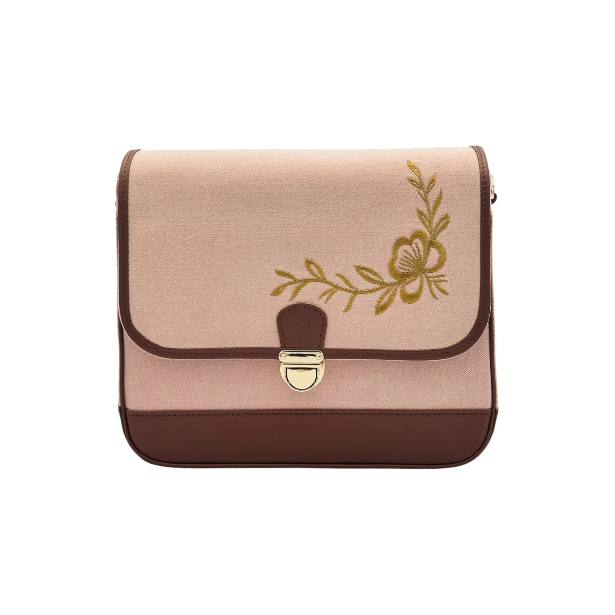 A rectangular shoulder bag in dusty pink and dark brown, featuring a gold floral embroidery on the flap and a gold-tone metal clasp.