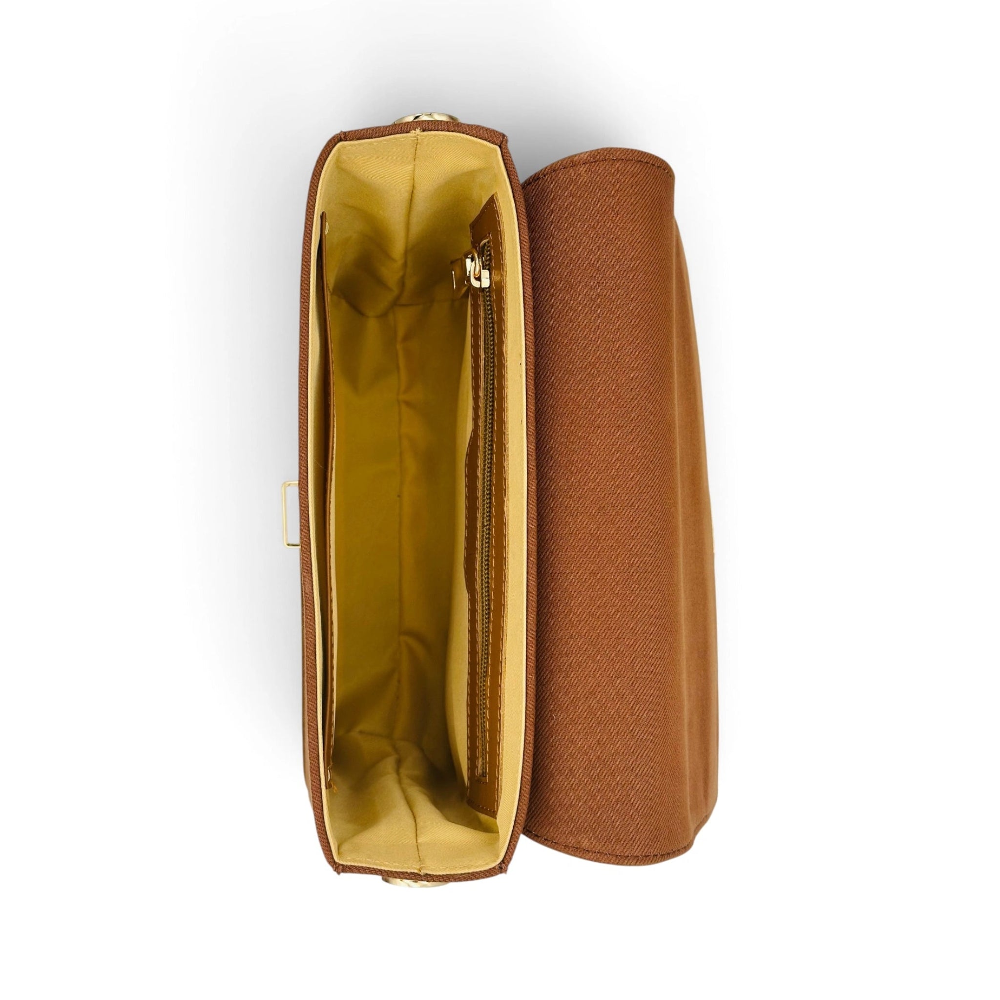 A brown denim shoulder bag by needlesay shown open from a top-down view, revealing a mustard yellow interior lining and a zippered pocket, next to its matching brown closed exterior.