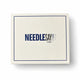 Needlesay signature gift box, cream with navy trim and logo, closed