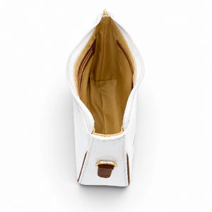 Interior view of the Needlesay white denim shoulder bag showing spacious tan lining, two internal zip pockets, stitched construction, and gold-tone hardware.